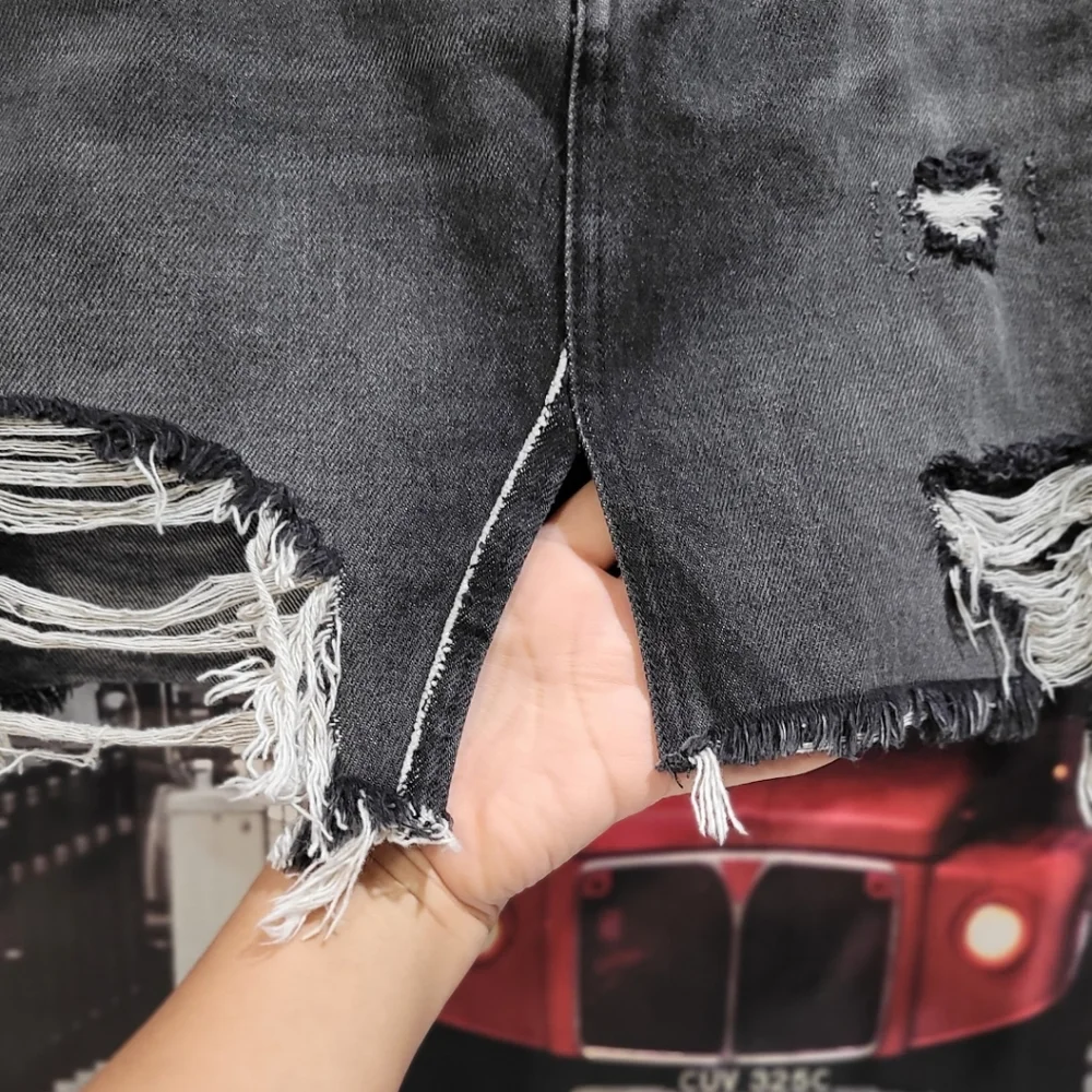 We The Free Distressed Washout Black Denim Mini Skirt